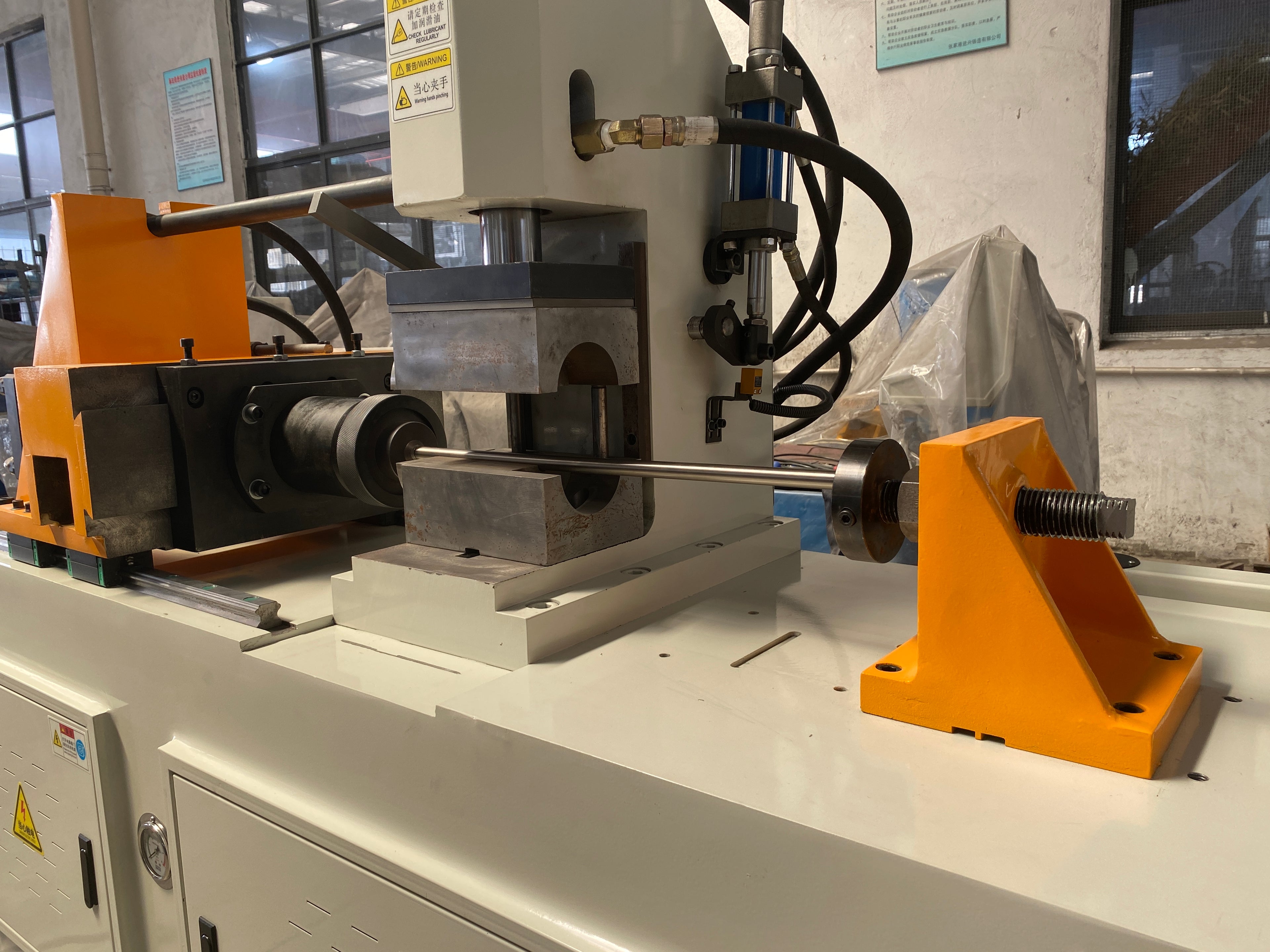 Tube forming machine